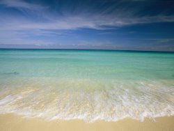 Collection Clear Blue Water And Wispy Clouds Along The Beach at Cancun