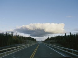 Raymond Gehman A Thundercloud Forms Above The Makenzie Highway