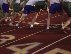Raymond Gehman Runners Lined Up on a Track Ready for The Starting Gun